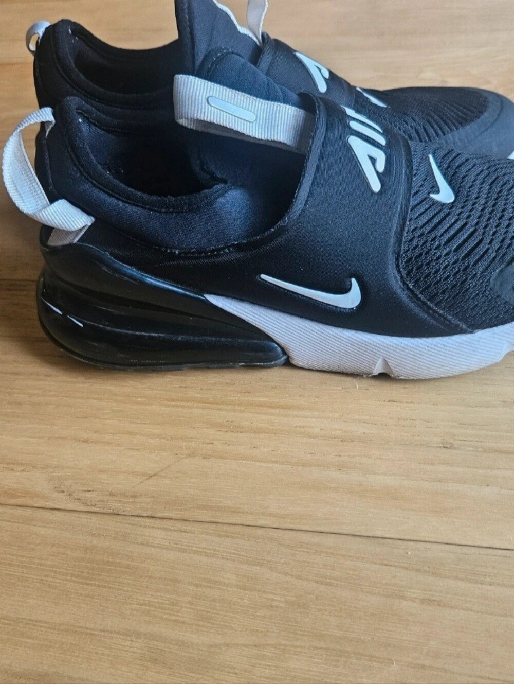 Nike Kids Black and White Slip-On Air Cushion Sneakers